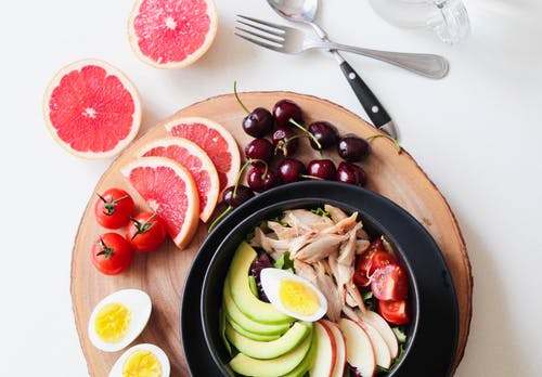 A bowl full of fruits and nutrition to emphasise on the importance of proper nutrition