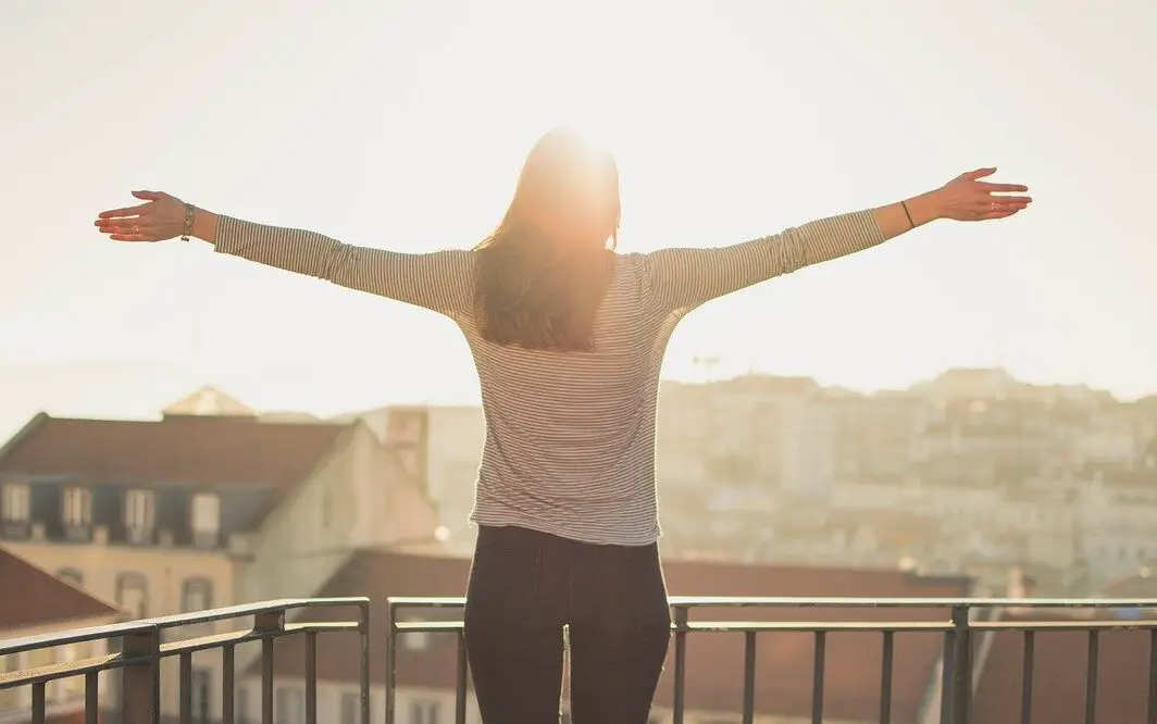 balcony, woman, standing, living intentionally, intentional living